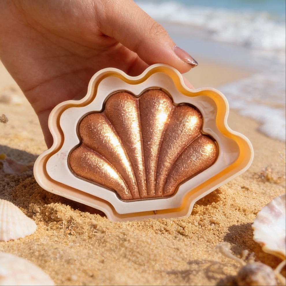 Iluminador Compacto con diseño de Concha