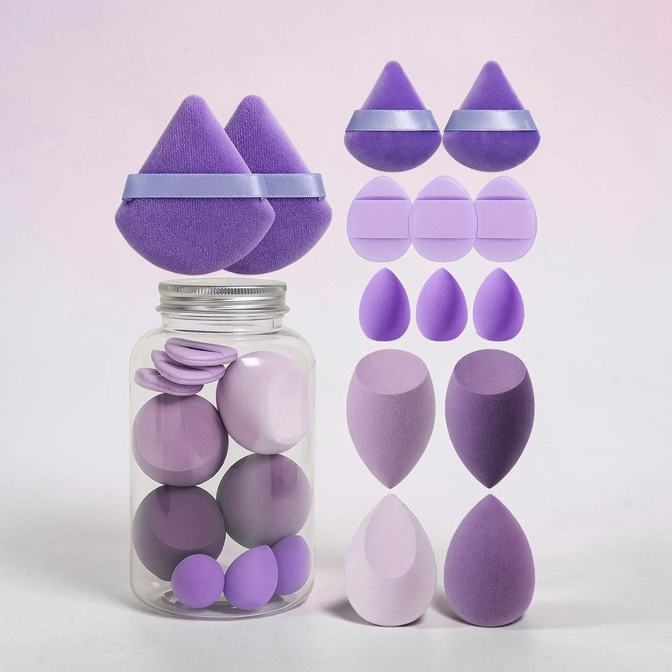 Set de esponjas de maquillaje AINARA SHOP GT en tonos morados con aplicadores de terciopelo en frasco transparente